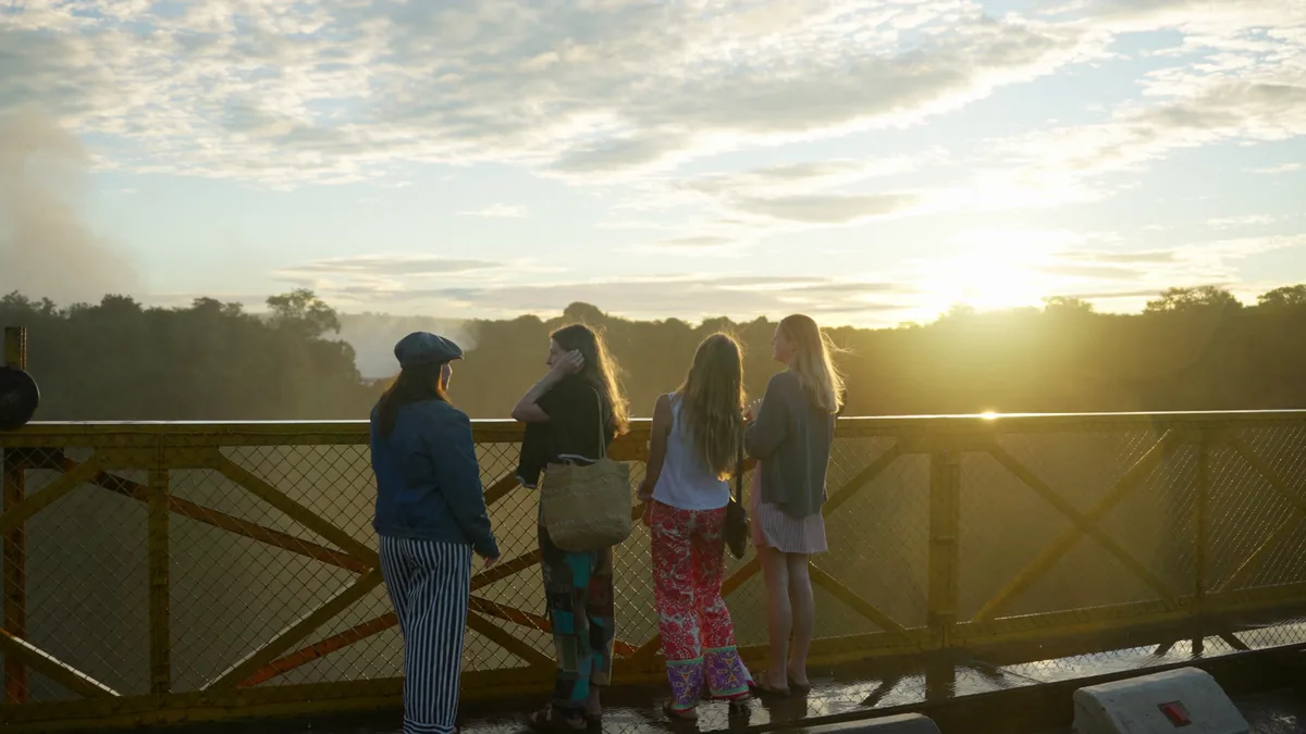 Friends watching the sunset over the gorge